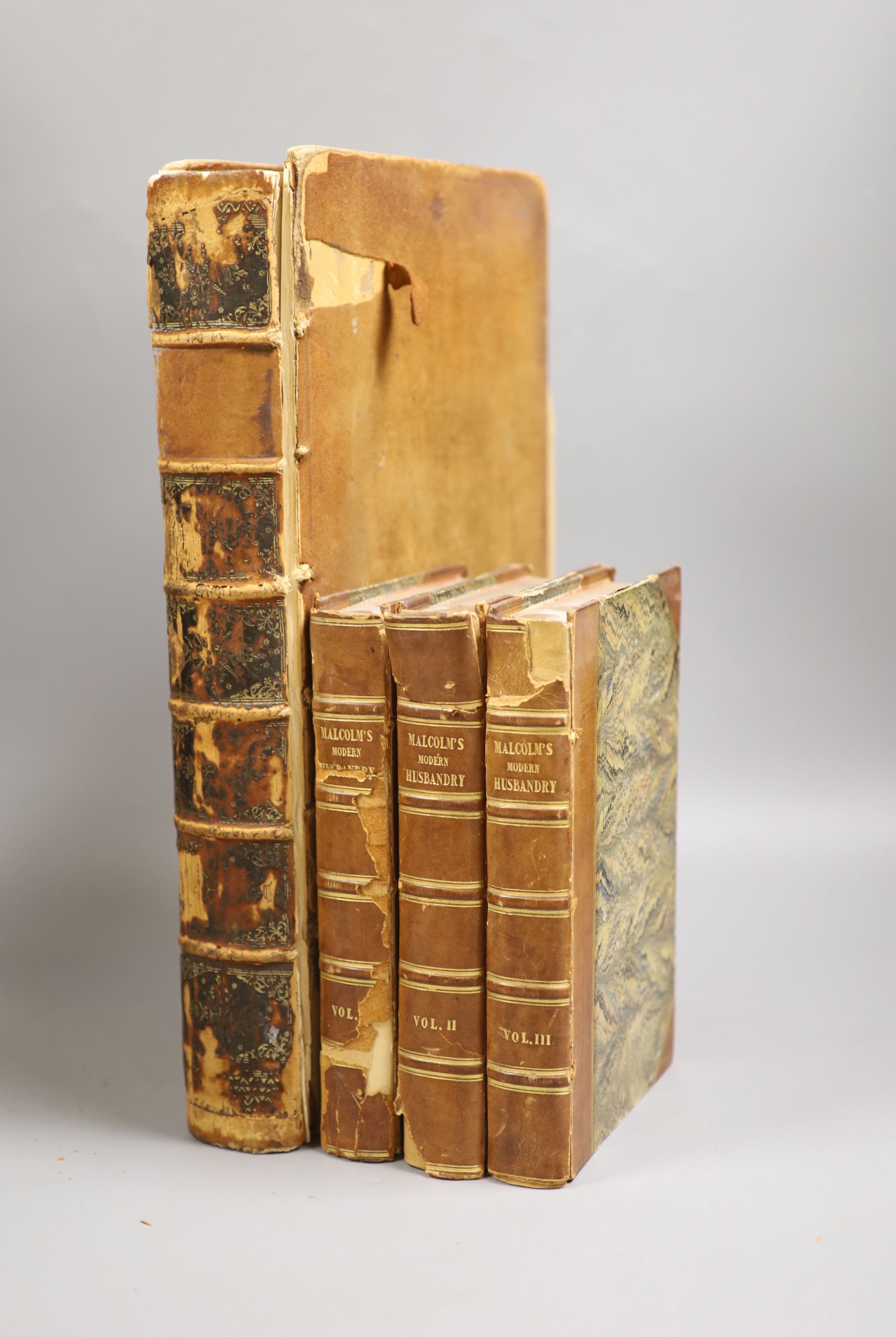 Malcolm, James - A Compendium of Modern Husbandry, Principally written during a Survey of Surrey, 3 vols, 8vo, half calf, spines brittle and with loss, with folding coloured map and 7 plates, London, 1805